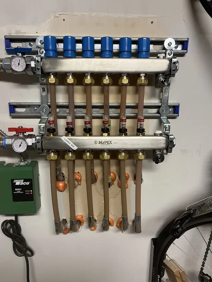 Plumber performing Gas Line Installation at a residential property in Albemarle